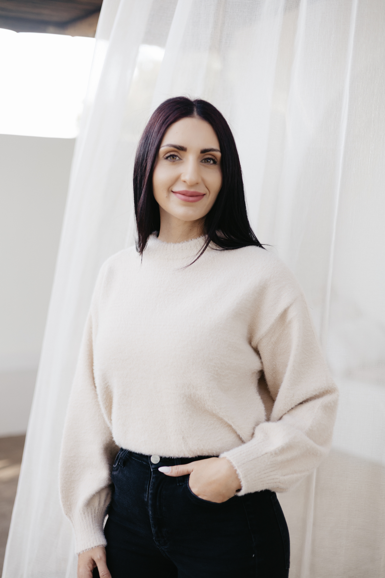 CROWNED knitwear — cream mock-neck sweater